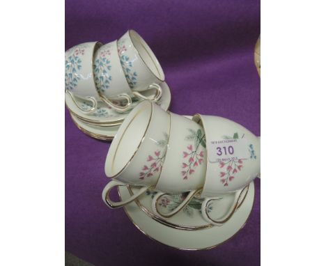 A selection of vintage tea cups and saucers by Clare