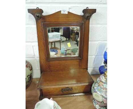 A vintage oak hall way mirror with shelf and under drawer 