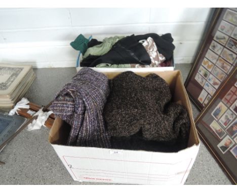 A selection of vintage and retro cloathes jackets and textiles etc
