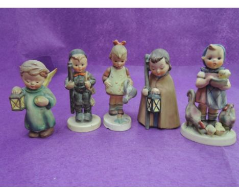 Five Hummel figures including girl with lamp, chimney sweep boy etc, (some af)