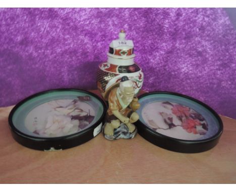 A selection of oriental decorations and ceramic figurine