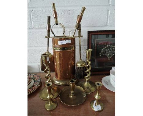 A fire side companion set and candle stick set with twisted stem