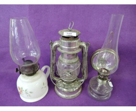 A selection of oil burning lamps and lantern 