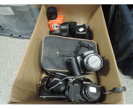 A box of cameras and equipment including Rolleiflex SL35 with Planar 1,8/50 lens, a Zenit EM, a Fujipix digital camera and tw