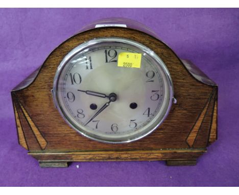 A vintage treen mantle clock with chime