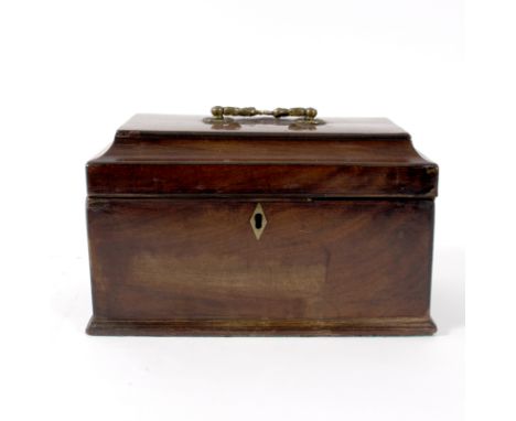 A George III mahogany tea caddy, the cover with shell and scroll handle, later fitted for stationery, 25.5cm wide