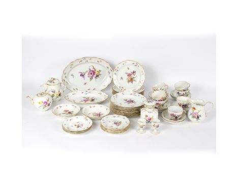 A Meissen part breakfast service, decorated floral sprays with gilt borders, a scent bottle to match, total approximately 47 