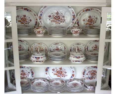 A Chamberlain's Worcester dinner service of approximately one hundred and eight pieces, painted flowers in blue and orange, t