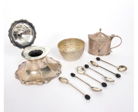 A silver capstan type inkwell, Sheffield 1913, with petalled border, 12.5cm wide, a silver bowl, six coffee spoons with bean 