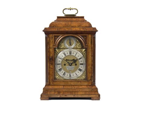 A George III eight-day, hour repeat bracket clock by John Ellicott, London, the brass arched dial with gilt metal rococo span