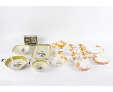 A Shelley tea service of twenty-two pieces, transfer printed flowers and foliage in orange, green and browns, four Stavangerf