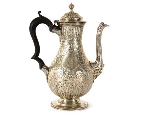 A Victorian silver coffee pot, Charles Stuart Harris, London 1879, with Eastern style decoration, 20.5cm high, approximately 