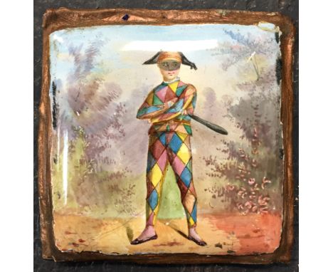 A 19th Century enamelled plaque, painted with a harlequin in a landscape and blue enamel to reverse, 6.5cm x 6.5cm