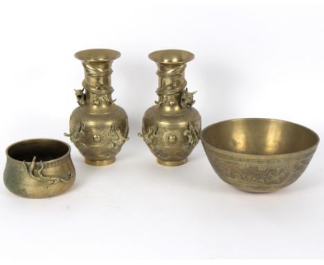 A Chinese brass bowl, a pair of vases applied dragons and another bowl   Condition Report:  Overall good condition, light wea