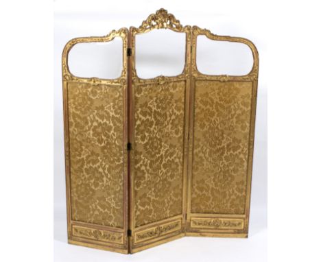 A giltwood framed three-panel screen with carved cresting and bevelled glazed panels above fabric sides, 186cm high