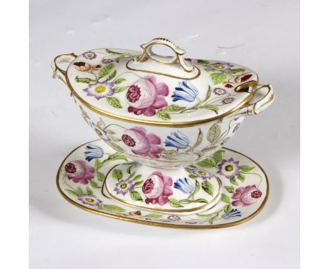 An English porcelain sauce tureen, cover and stand, early 19th Century, with moulded floral decoration and gilt rims, 18cm wi