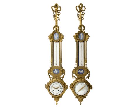 A late 19th Century French ormolu and porcelain cartel clock and barometer, mounted fruit, foliage and ribbon tie surmounts, 