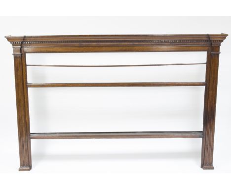 An 18th Century hanging shelf with dentil cornice and fluted columns to the sides, 188cm wide