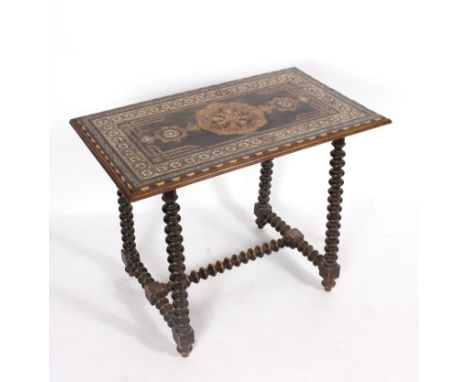 An Indo-Portuguese side table, the top inlaid with geometric motifs to a multi-field border, on bobbin turned legs, 80cm wide