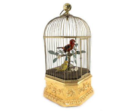A French automaton by Bontems of Paris in the form of a birdcage containing two birds, one on a floral branch, the square gil