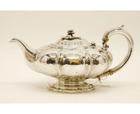 A George IV silver teapot marks for London with ivory insulators,  Eames & Barnard, 1825, 12.5cm high