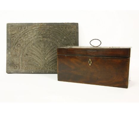A 17th century carved oak panel, 28 x 40cm, and a Georgian mahogany tea caddy.