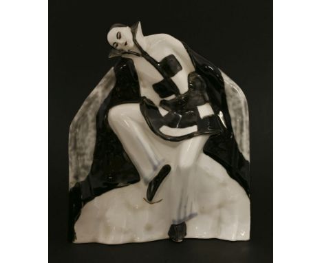 A Limoges porcelain table lamp, by Camille Tharaud, modelled as a dancer wearing a cloak, inscribed 'Tharaud' and with Limoge