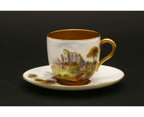 A Royal Worcester cabinet cup and saucer, painted with a ruined building and mountain landscape. Date marked for 1910.