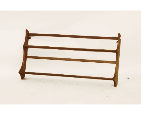 An Ercol open wall shelf, 96.5cm