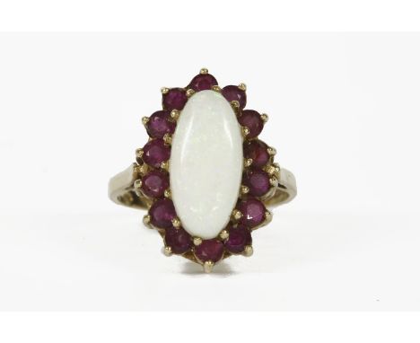 A 9ct gold oval cabochon opal and ruby cluster ring, London 1975, 4.06g