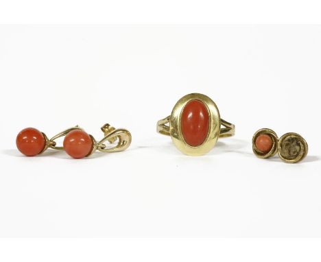 An Italian gold single stone coral cabochon ring marked 750,  a pair of 9ct gold coral bead drop earrings, and another pair o