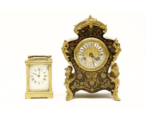 A late 19th century Boulle work boudoir clock, together with a small brass carriage clock