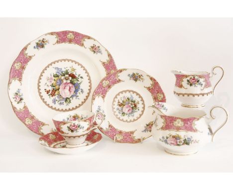 Royal Albert Lady Carlyle pattern tea and dinner service, having floral spray decorated centre within pink gilt border