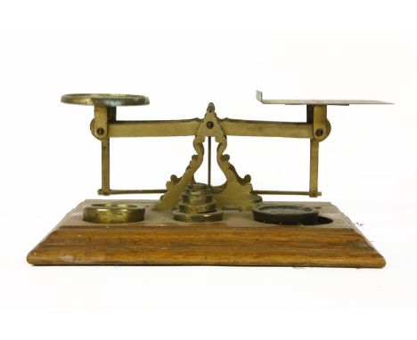 A large set of brass postal scales