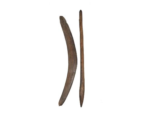 An Aboriginal boomerangDarling River Region, South East Australiawith carved linear and track decoration and with shaped ends