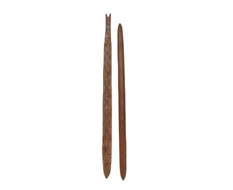 An Aboriginal fish tail clubArnhem Land, Australiawith incised and pigment decoration,109cm long,and an Aboriginal club, with