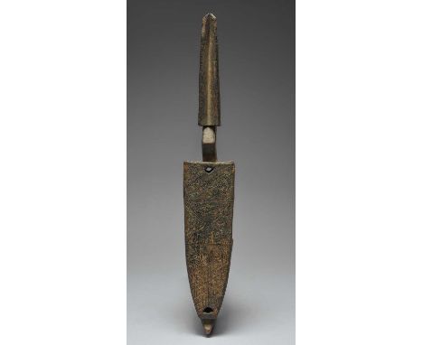 A Bambara door lockMaliwith a stylised figure and an incised linear decorated front,42.5cm high.ProvenanceTom Phillips Collec