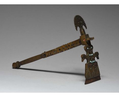 A Persian sugar cane axebronze with inset coloured glass beads and with a steel blade,26.7cm long.