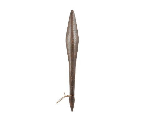 An Aboriginal clubAustraliaof swollen form with a pointed end and stepped terminal, with incised decoration depicting birds a