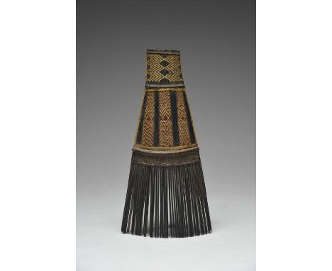 A Malaita Island combSolomon Islands, Melanesiatree fern, natural and dyed fibre with gum,23cm long.