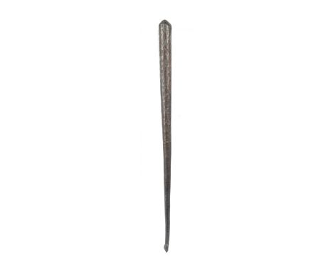 An Aboriginal fly whisk handleAustraliaof tapered form with a knopped terminal and with incised linear and emu track decorati
