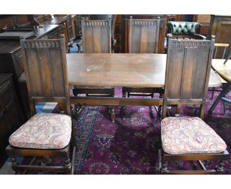 An Oak Ercol Style Refectory Dining Table Together with a Set of Four Panelled Back Dining Chairs, Table 178cm wide 