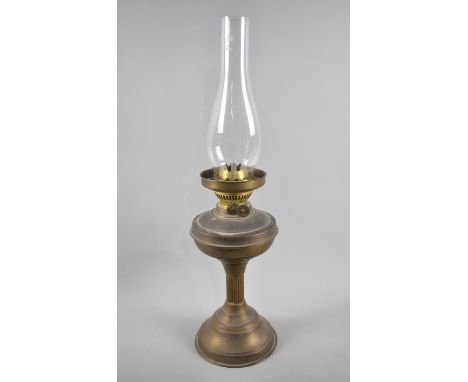 A Vintage Oil Lamp with Glass Chimney 