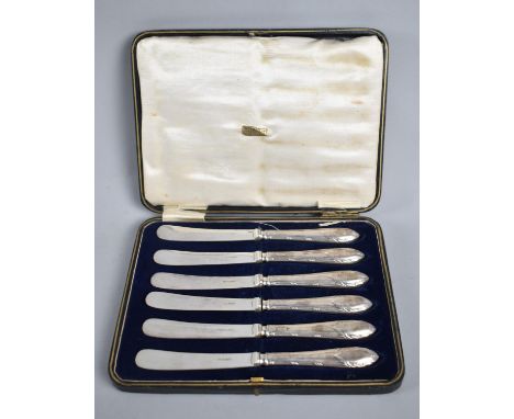 A Cased Set of Silver Handled Butter Knives by George Housen, Sheffield 1925, the Blades by Harrison and Howson 