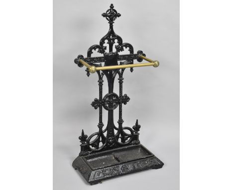 A Late Victorian Cast Iron and Brass Stick Stand with removable Cast Iron Drip tray, 45cms Wide and 84cms High 