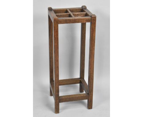 An Edwardian Four Division Oak Stick Stand, 25cms Square and 66cms High 