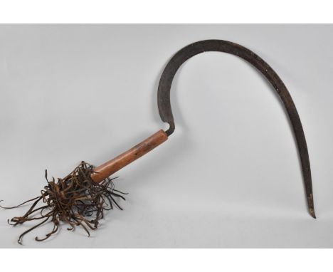 A Vintage Egyptian Harvest Sickle with Leather Tassels 