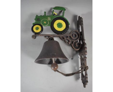 A Reproduction Cast Metal Bell with Tractor Motif, 36cm high 