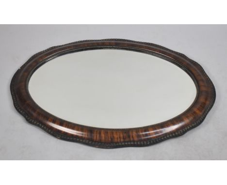 A Vintage Oval Cushion Framed Wall Mirror, 87cm wide 