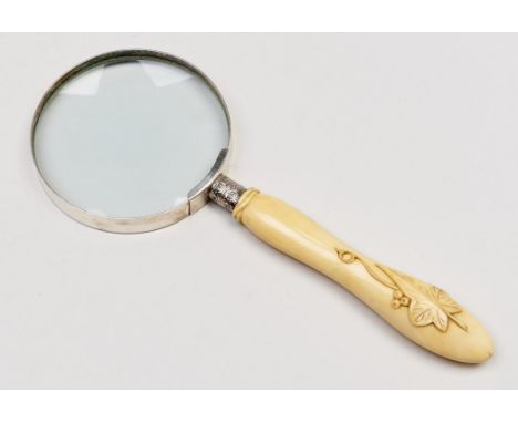 A Victorian ivy leaf carved bone handle and silver ferrule, fitted to a later magnifying glass, 25.5cm overall, ferrule Sheff